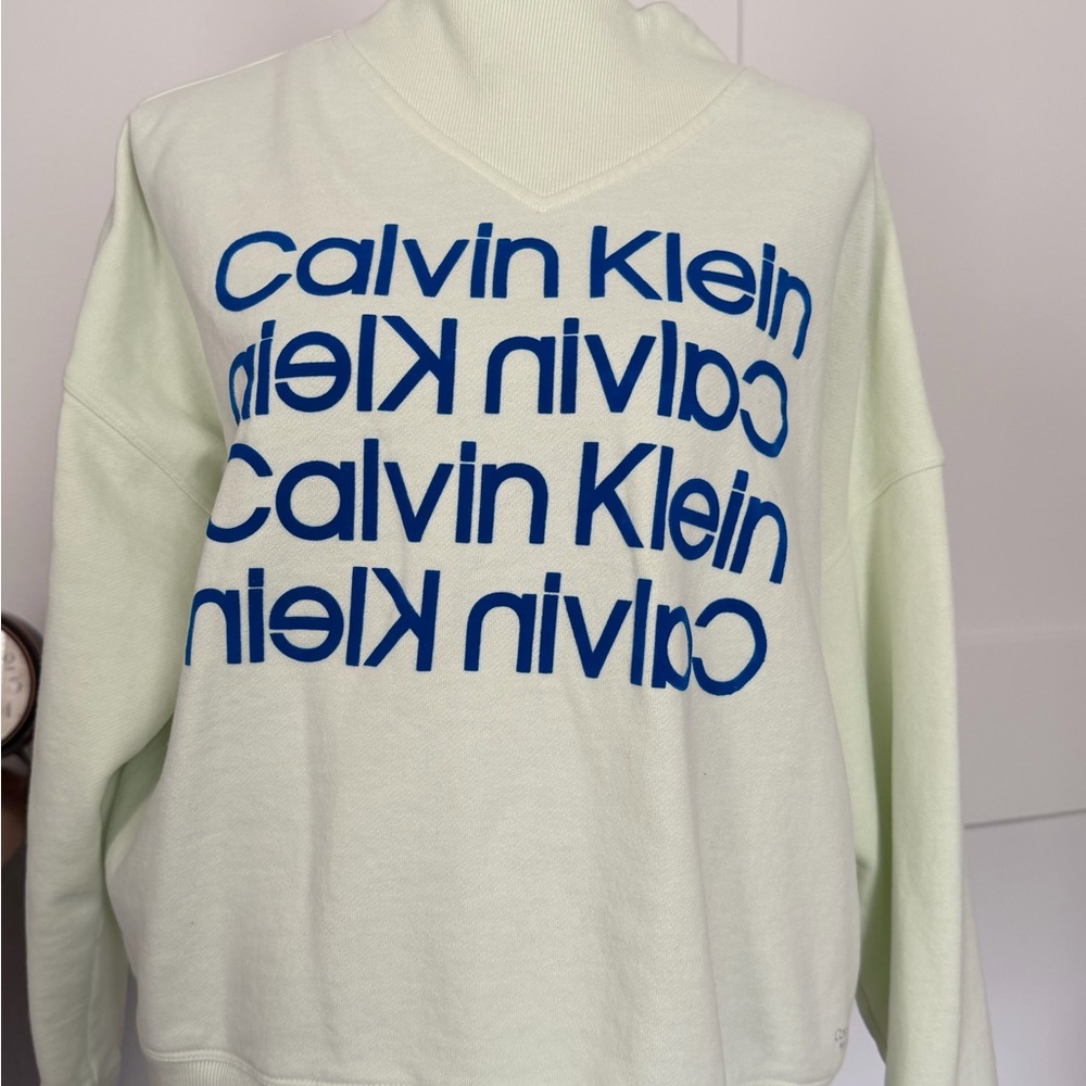 Calvin Klein light yellow Sweatshirt with Blue Text
